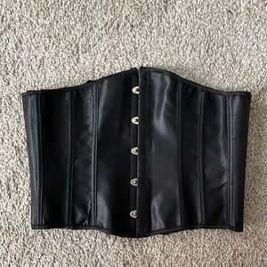 CORSET** runs small